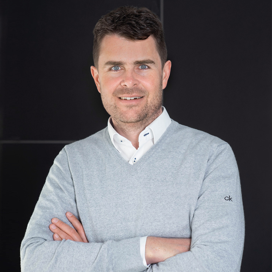 Phillip Truppe im grauen Pullover